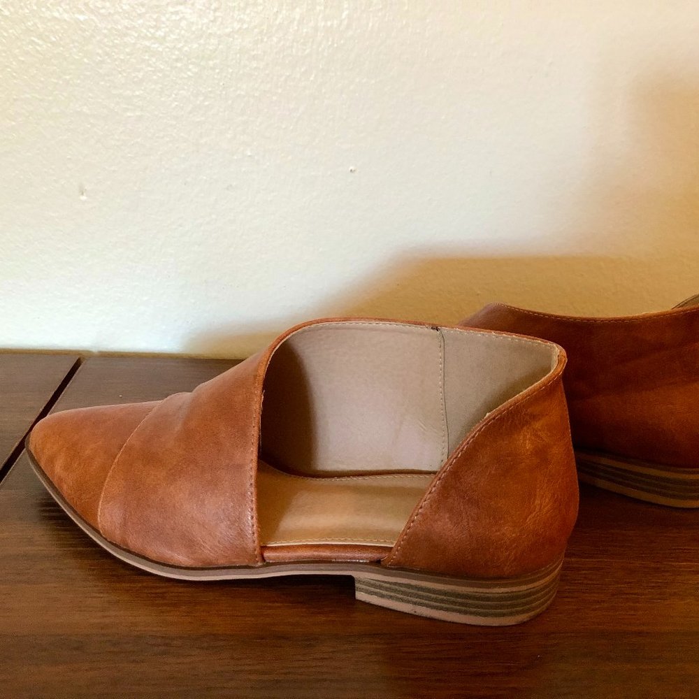 Faux leather flats with side cutouts